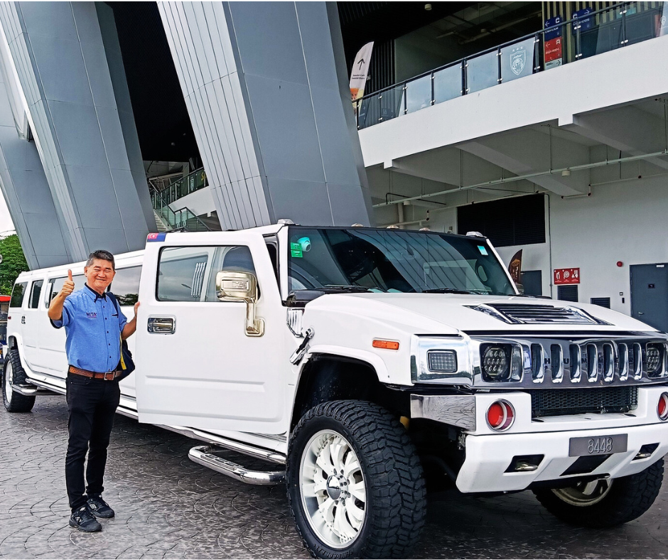 AllOnlineFair.com founder Mr. Wong with Hummer at JDT Stadium Johor Bahru promoting online travel fair and global online exhibitions